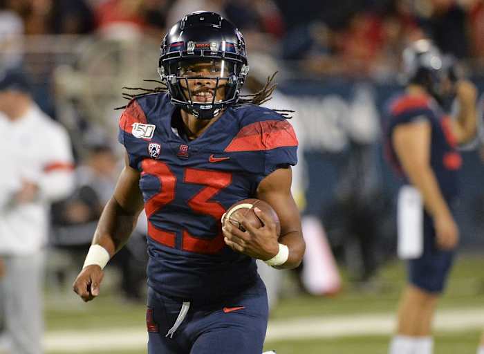 Sep 28, 2019; Tucson, AZ, USA; Arizona Wildcats running back Gary Brightwell (23) warms up before the game against the UCLA Bruins at Arizona Stadium.